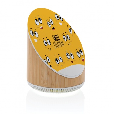 Logo trade promotional giveaways image of: Ovate bamboo 5W speaker with 15W wireless charger