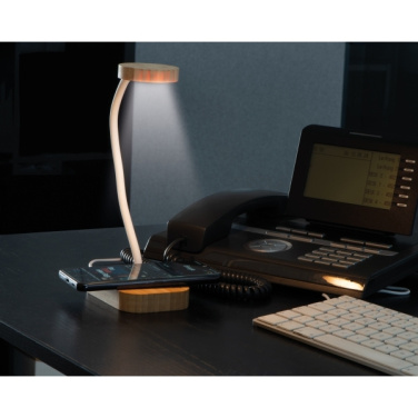 Logotrade ärikingi foto: Juhtmeta laadijaga laualampTomsk